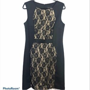 Black sleeveless dress w/ lace detail. Size 10